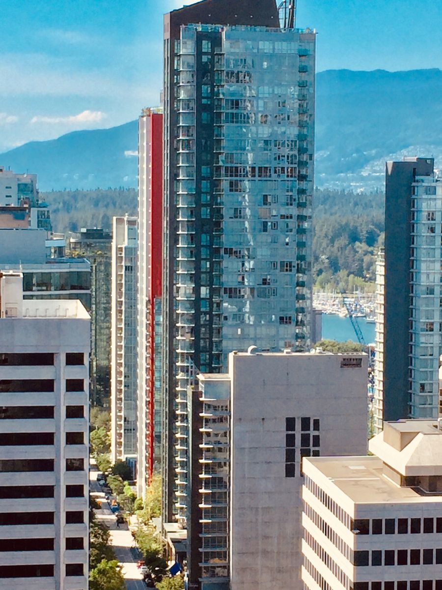 Vancouver, downtown high-rises against the North Shore mountains