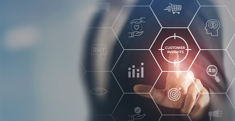 Hand touching a customer insights icon on a digital screen