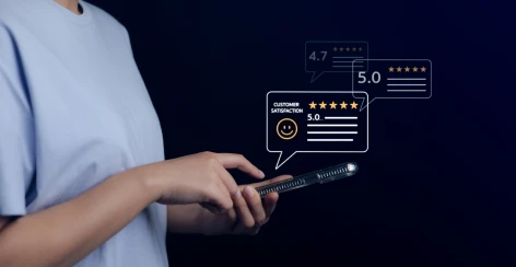Phone with five-star review ratings above it