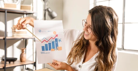Woman presenting a sales growth chart