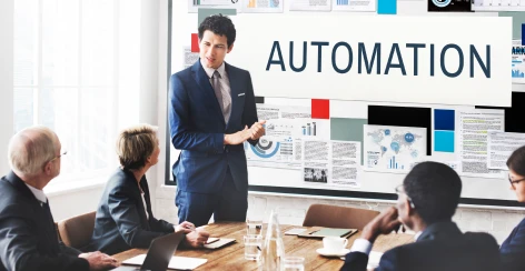 Presenter explaining marketing automation to a meeting