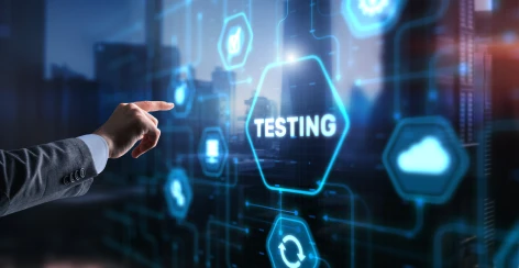 Hand pointing at a Testing icon on a digital interface