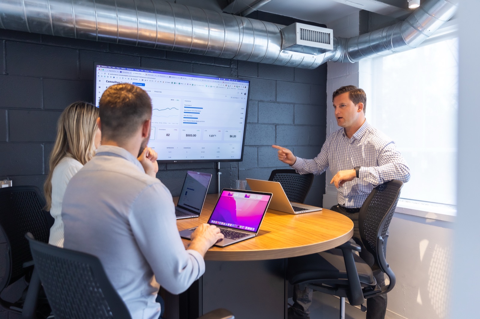 The Consultus Digital team in a strategy session