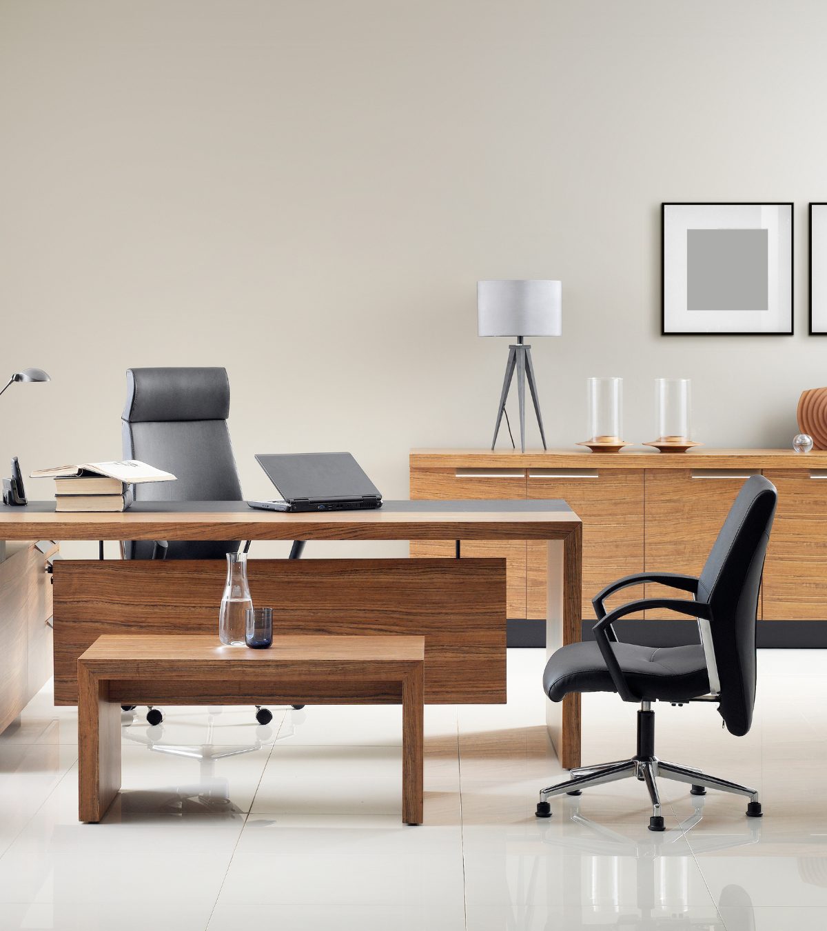 Office furniture showroom with wooden desks and chairs